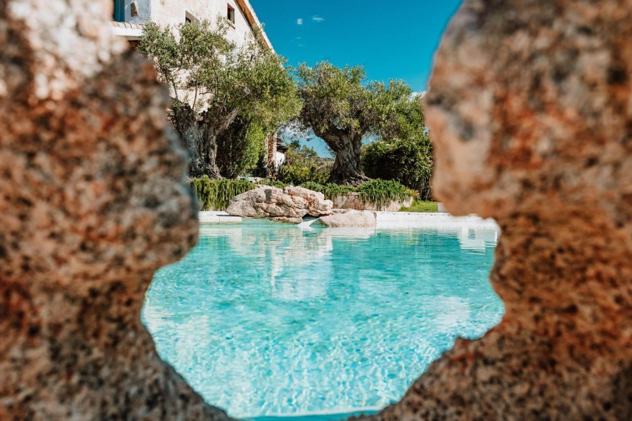 Hotel Pulicinu Baja Sardinia Exterior photo